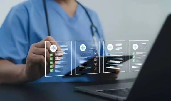 A health worker using a digital tablet application to strengthen clinical data collection